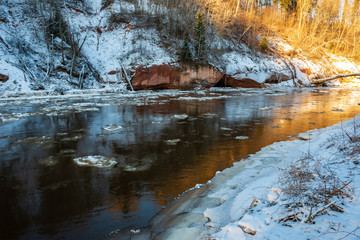 frozen forest river in winter