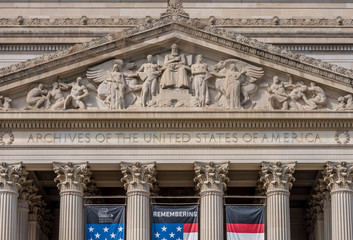 United States National Archive Building in Washington DC with USA flag