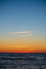 colorful sunset on the sea beach in summer