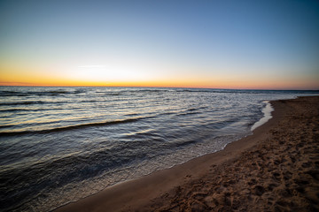 Fototapeta na wymiar colorful sunset on the sea beach in summer