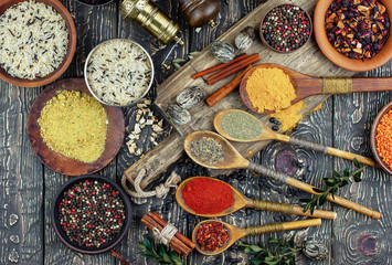 Obraz na płótnie Canvas Spices and seasonings for cooking in the composition on the table