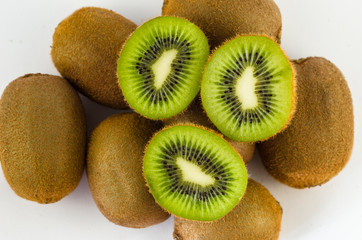 Kiwi on white background, juicy still life of fruit. Useful fruit for a healthy diet.