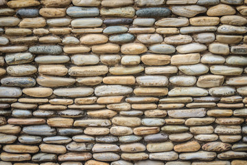 Beautiful River Pebble Wall Background. Seamless pebble stone floor and wall pattern arranged for texture wallpaper.