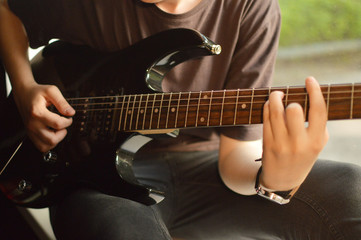 Fototapeta premium Playing guitar