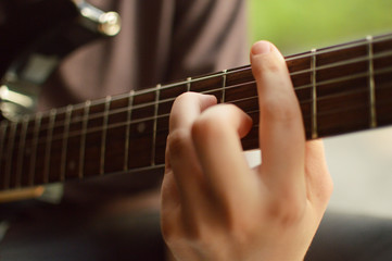 Playing guitar