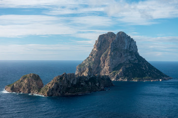 Fototapeta na wymiar The island of Es Vedra in the sea of Ibiza