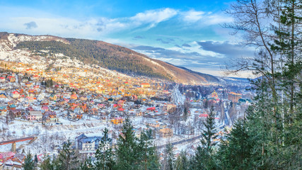Winter landscape - top view of the city Yaremche in the Carpathians Mountains valley, in Ukraine