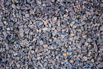 surface covered with small gray stones.