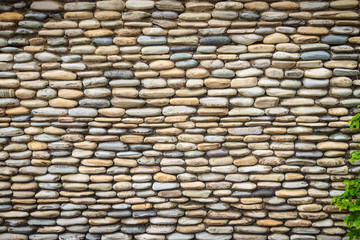 Beautiful River Pebble Wall Background. Seamless pebble stone floor and wall pattern arranged for texture wallpaper.