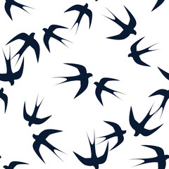 Swallows soaring in the sky seamless pattern. Design for printing on fabric