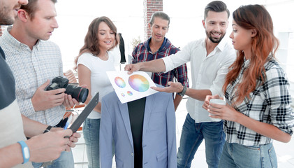 team of designers discussing the color palette