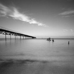 Long exposure shot of the sea and a pier in Ukraine.