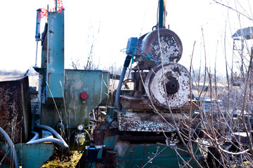 Old used rusty metal stone processing machine