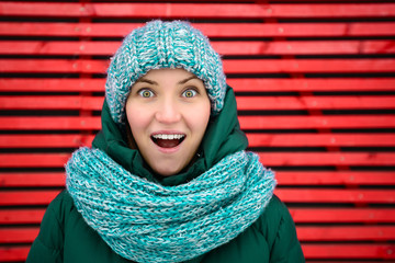 close-up of a one young surprised woman