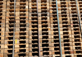 background of many pallets for the transport of the goods