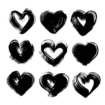 Abstract textured black ink strokes in heart shape big set isolated on a white background