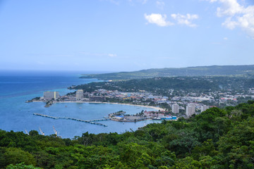 Wide aerial  shot of coastal Mediterranean town