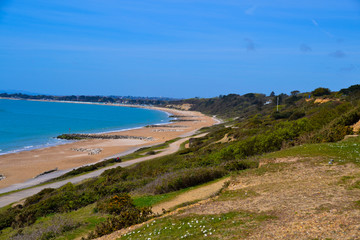 Stunning beach and commonland landscape with bright blue sky