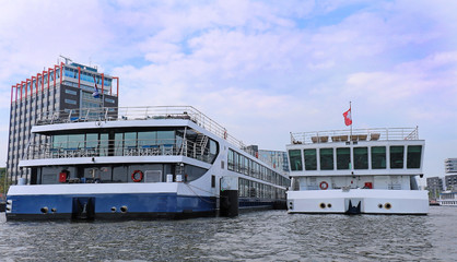 Large cruise ships in Amstel river