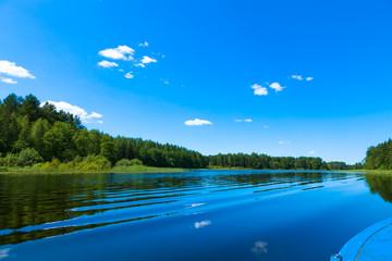 Blue sky and blue lake in summer. Famous lake Seliger. Russia.