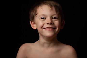 smiling mising tooth boy © greggsphoto