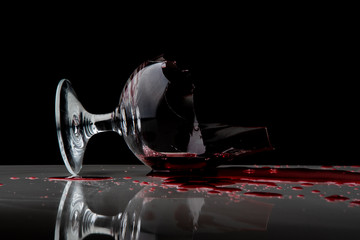 Broken Wine Glass on Black Background