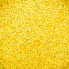 Yellow Mango milkshake with bubbles texture