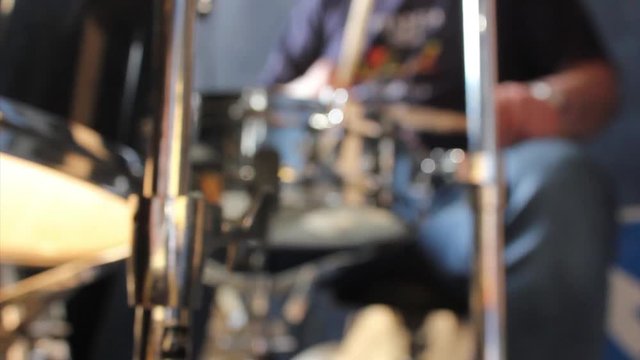 Drummer plays a pattern, the is on the front of the video, the drummer is blur, hd