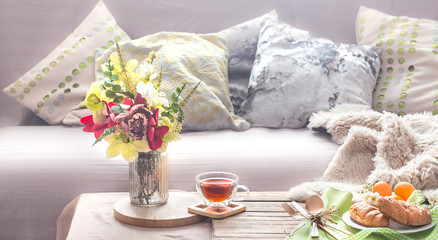 Homely cozy spring interior in the living room