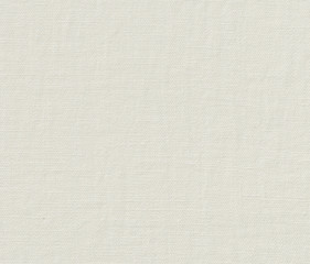 Crumpled white linen fabric texture background.