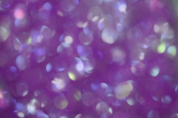Purple blurred defocused lights background. Effect bokeh.