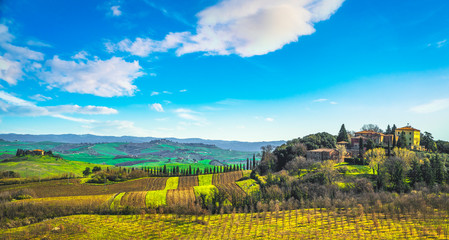 Obraz premium Radi village, rolling hills, trees and green fields panorama. Siena, Italy Europe