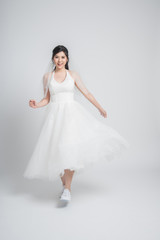 Fototapeta na wymiar Happy young Asian bride