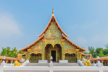 Naklejka premium The sanctuary, Wat Wang Kham Temple, Khao Wong District, Kalasin Province, with the blue sky cloud.The public property in Thailand.