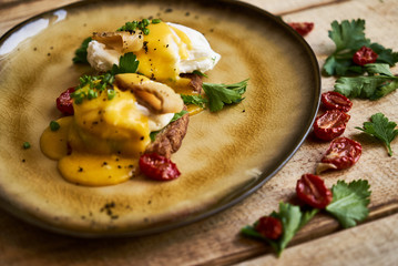 Healthy spring breakfast food with avocado toast, poached egg