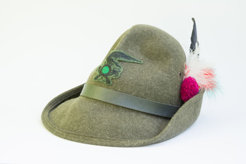Specimen of an alpine hat belonging to the Italian Alpine troops of the Transmissions Department. The Cappello Alpino is the most distinctive feature of the Italian Army's Alpini troops uniform.