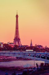 Sunset view of  Eiffel Tower, Alexander III Bridge and river Seine in Paris, France.