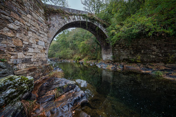 Fototapeta na wymiar old bridge with a wide-angle lens