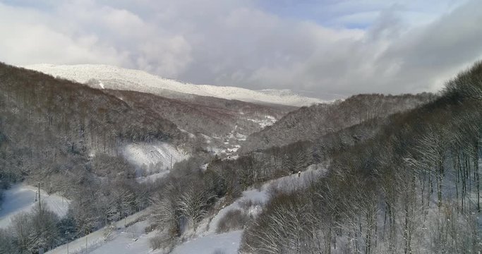 Aerial view: Landscape. Winter Nature. View of the mountain valley of the Runa. Transcarpathian Ukraine. 4k