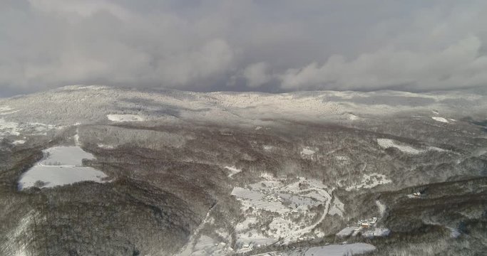 Aerial view: Landscape. Winter Nature. View of the mountain valley of the Runa. Transcarpathian Ukraine. 4k