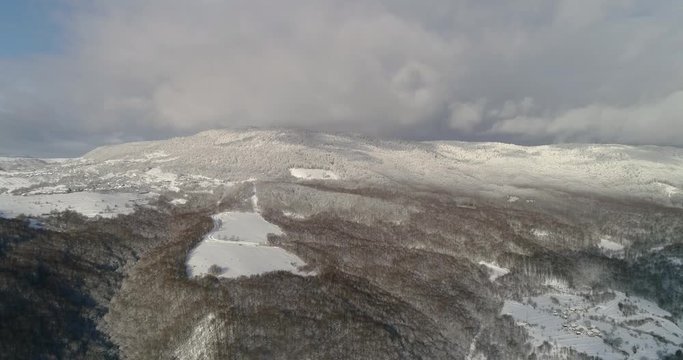 Aerial view: Landscape. Winter Nature. View of the mountain valley of the Runa. Transcarpathian Ukraine. 4k