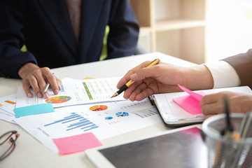 Close up Business People Analyzing Statistics Business Documents, Financial Concept