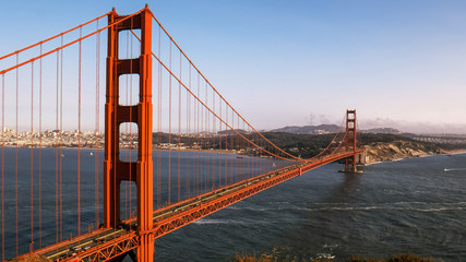 day time view of the golden gate bridge and shipping in san francisco