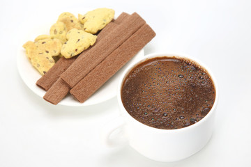 cup of hot coffee with biscuits