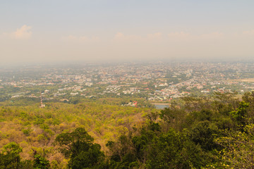 Chiang Mai cityscape view from Doi Suthep hills viewpoint. You can see the 180 degrees of Chiang Mai town under your feet. Chiang Mai is the largest city in northern Thailand.