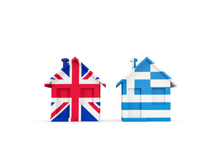 Two houses with flags of United Kingdom and greece