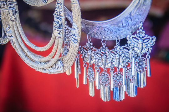 Beautiful traditional Hmong hill tribe silver ornaments for sale as souvenir at Doi Pui&rsquo;s Hmong ethnic hill-tribe village, Chiang Mai, Thailand.