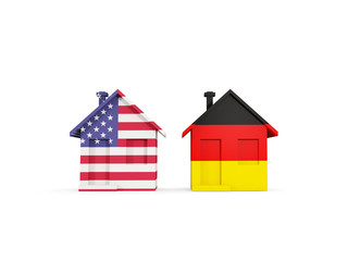 Two houses with flags of United States and germany