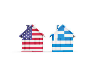 Two houses with flags of United States and greece