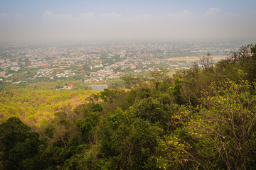 Chiang Mai cityscape view from Doi Suthep hills viewpoint. You can see the 180 degrees of Chiang Mai town under your feet. Chiang Mai is the largest city in northern Thailand.